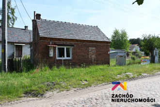 Działka z małym domkiem w Suchej
